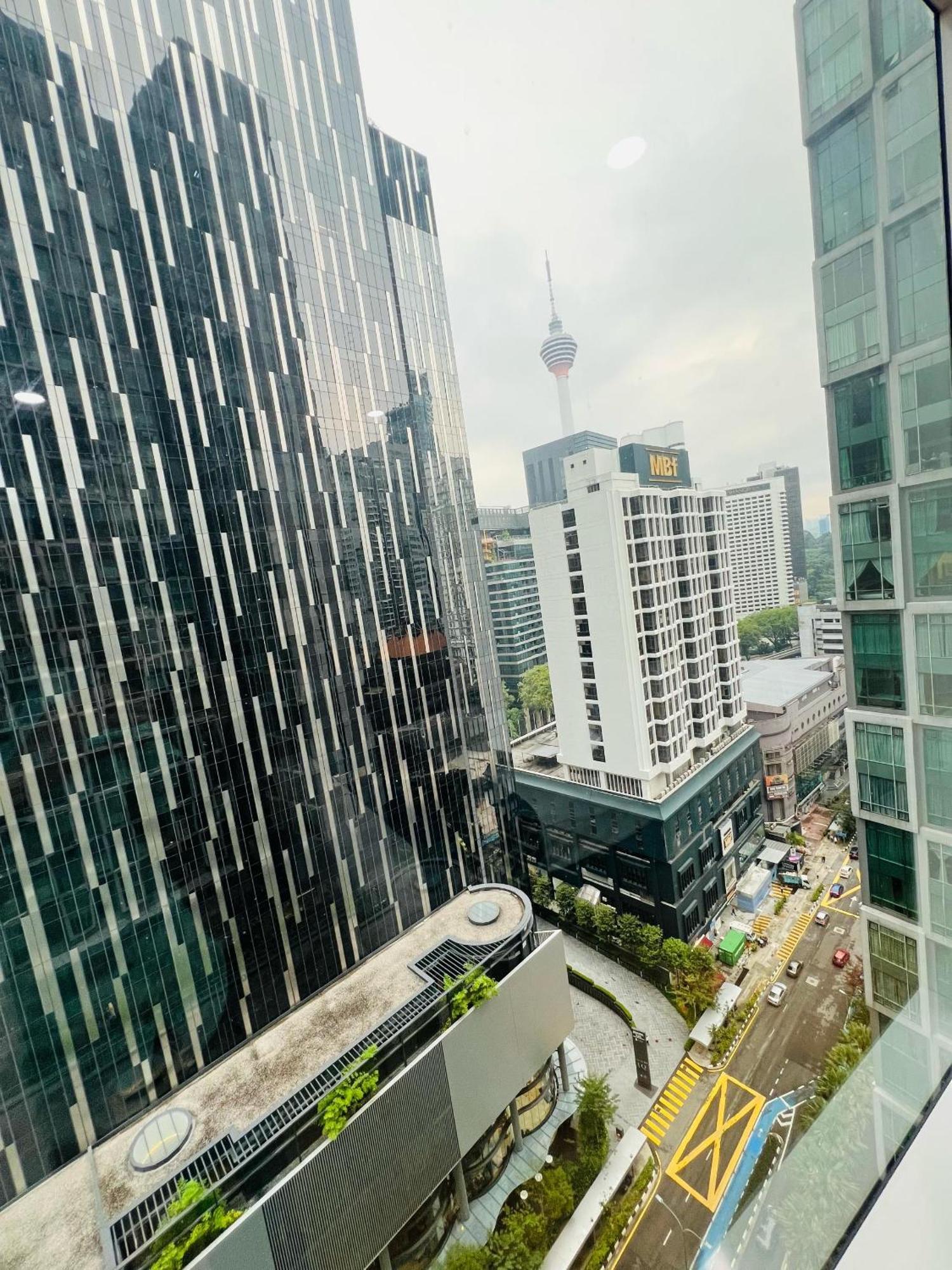 Soho Suites Klcc By Comfort Suites Куала Лумпур Екстериор снимка